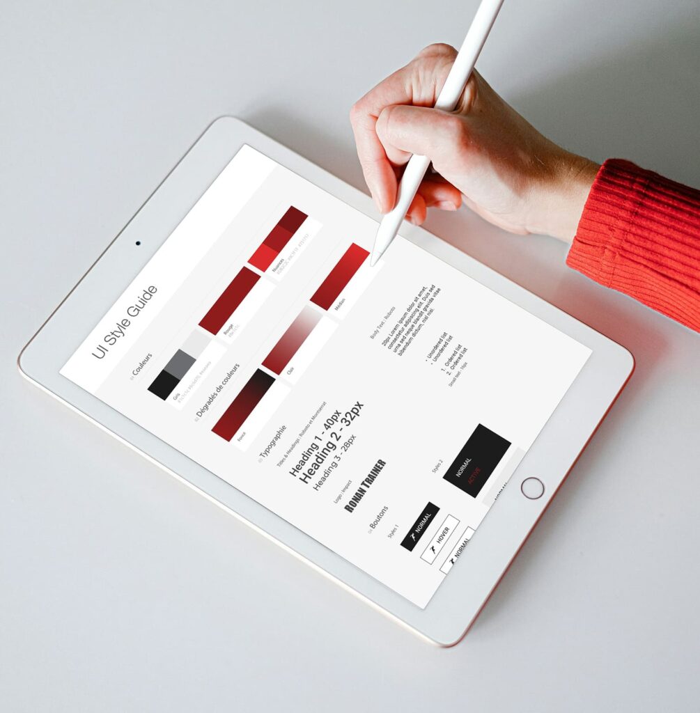 UI Style Guide du site Ronan Trainer créé par PA Design, présentant la palette rouge, noire et grise du branding sportif.